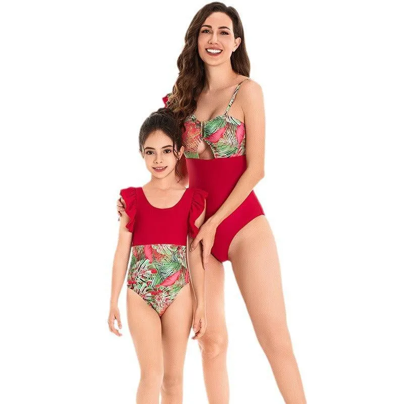 Chic Tropical Ruffle One-Piece Swimsuit - Lush Botanical Print with Elegant Solid Trim for Mother & Child