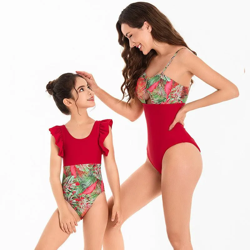 Chic Tropical Ruffle One-Piece Swimsuit - Lush Botanical Print with Elegant Solid Trim for Mother & Child
