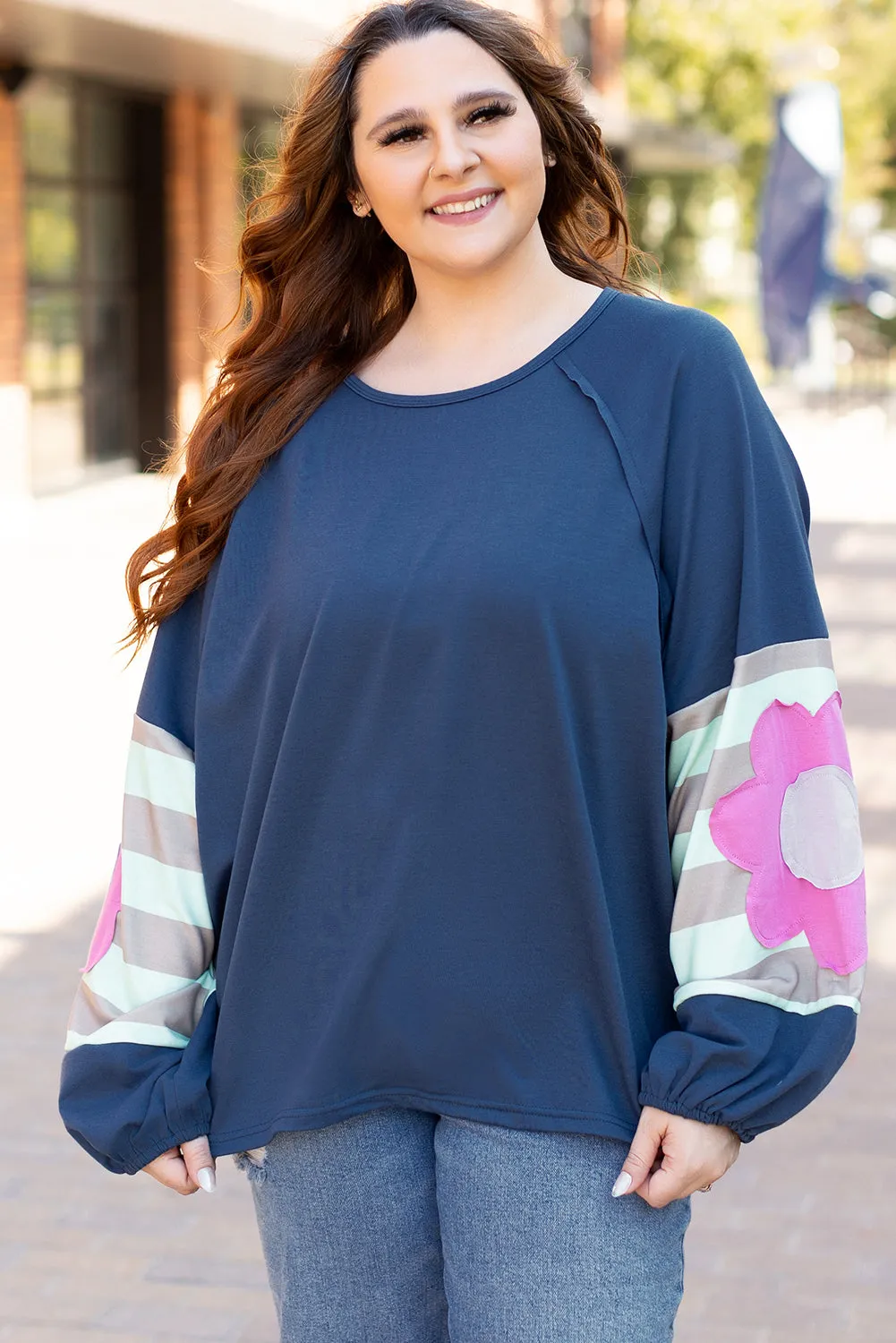 Flower Exposed Seam Oversized Top