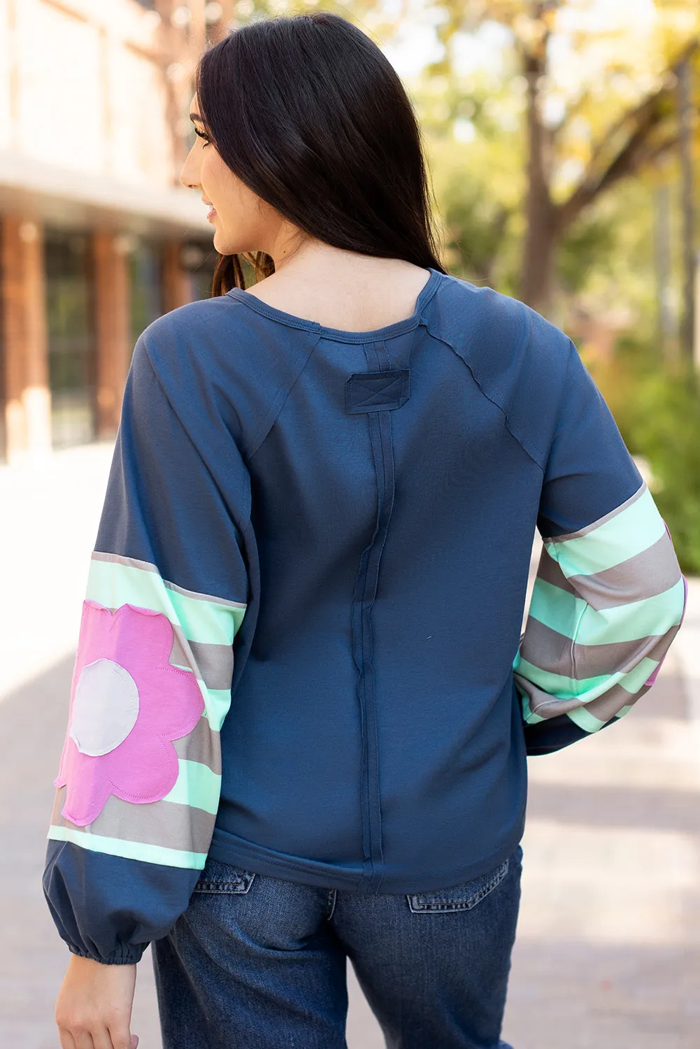 Flower Exposed Seam Oversized Top