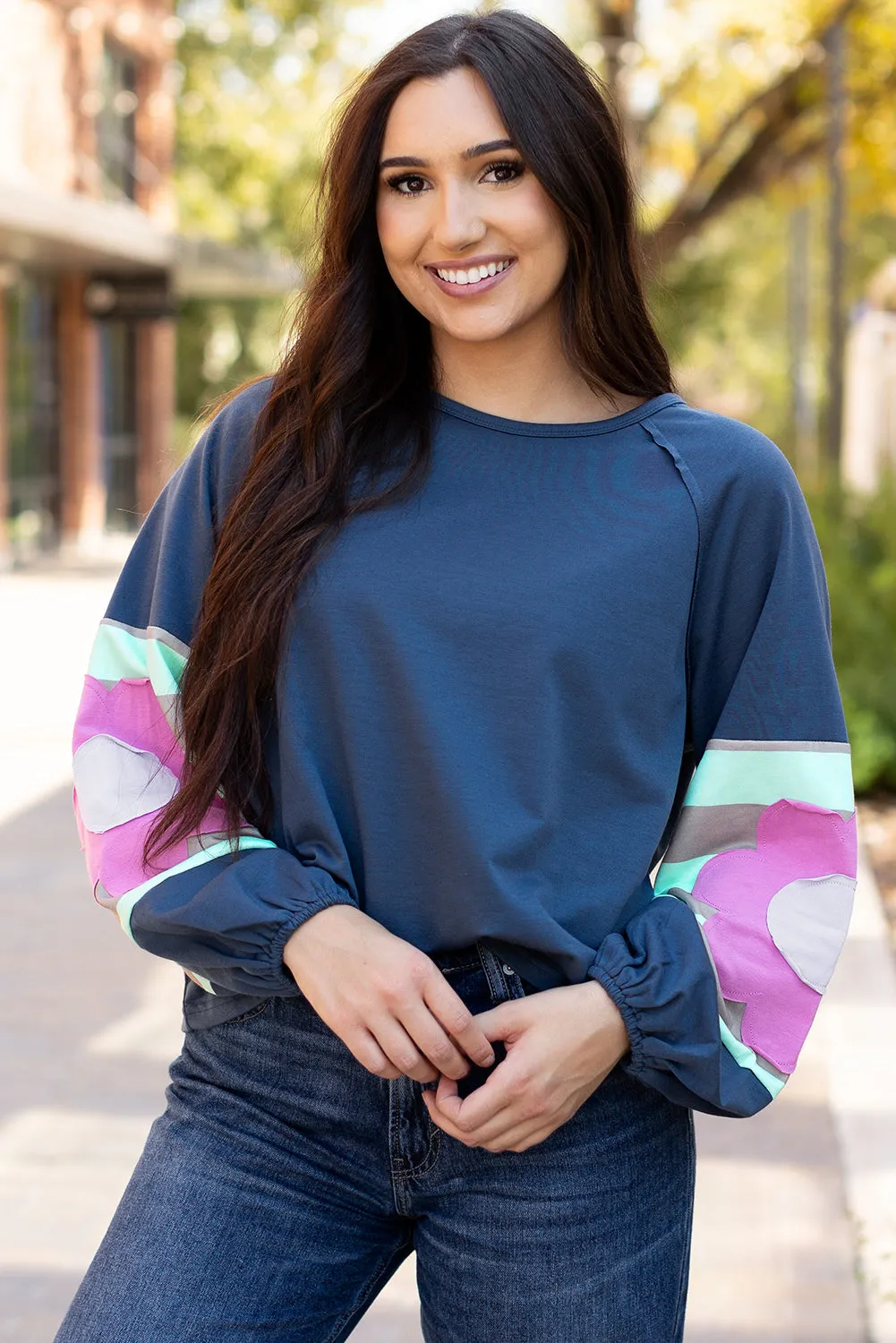 Flower Exposed Seam Oversized Top