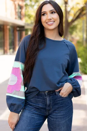 Flower Exposed Seam Oversized Top