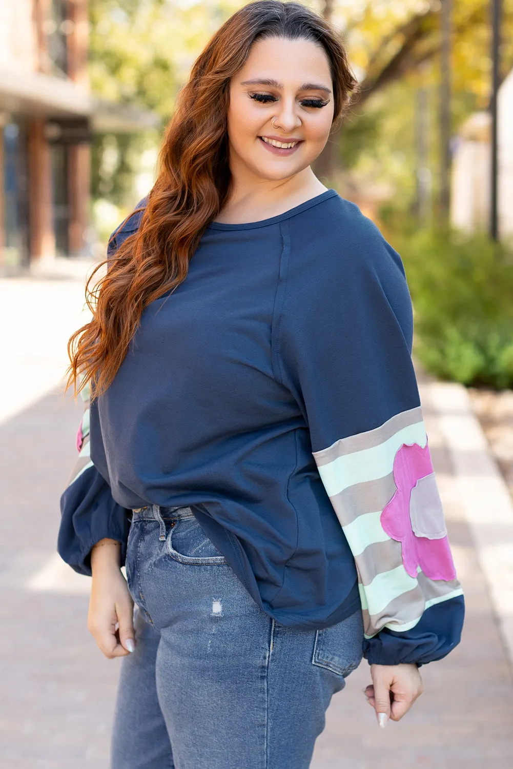 Flower Exposed Seam Oversized Top