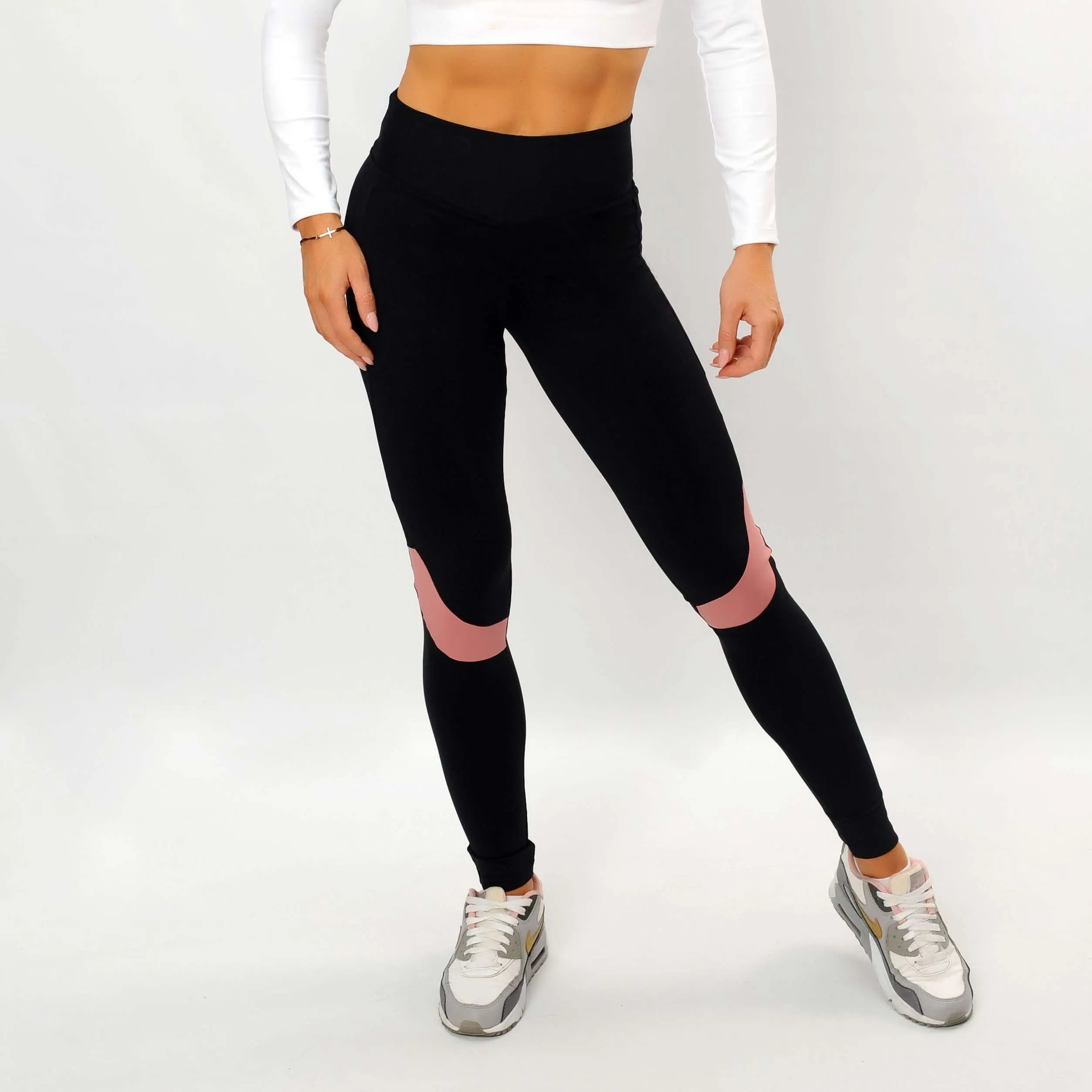 Leggins fitness negro y rosa.