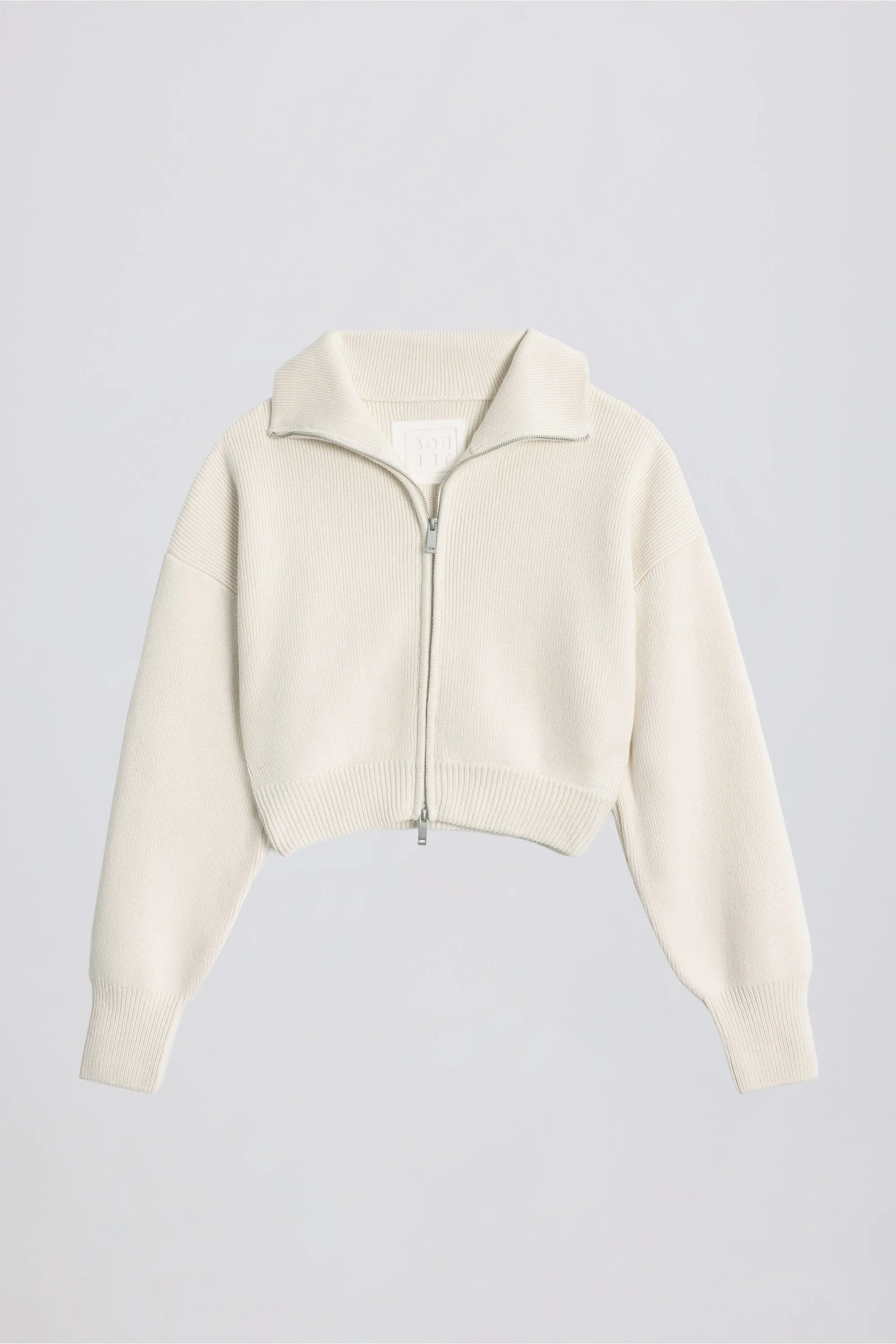 Ribbed-Knit Cropped Zip-Up Sweatshirt in Ivory