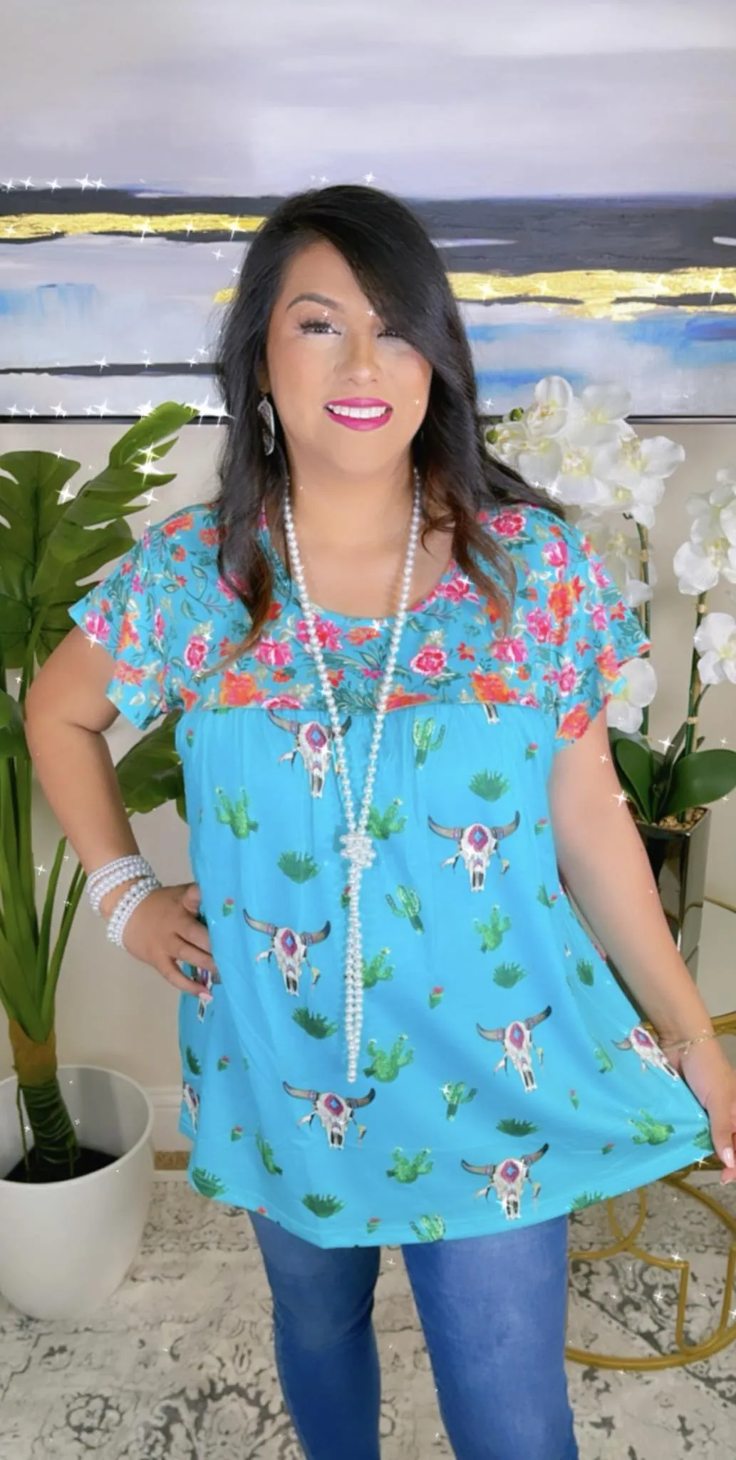 Turquoise steer print top with floral back