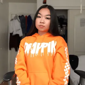 White Drippin | Orange Hoodie (Solid Checkered Drippin Sleeves)