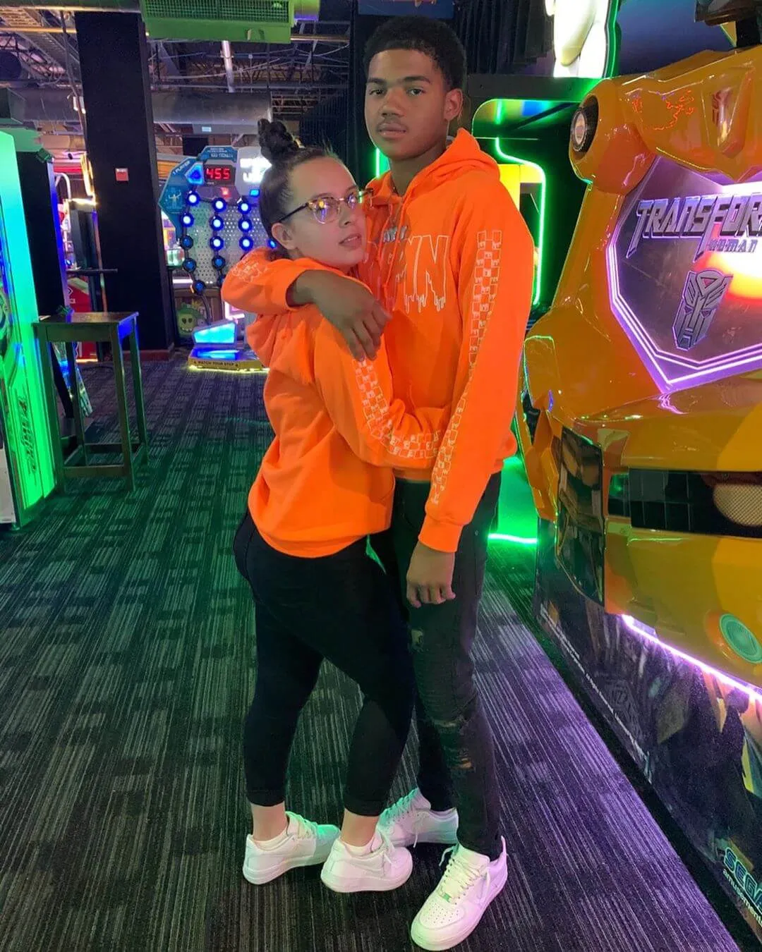 White Drippin Outline | Neon Orange Hoodie (Outline Checkered Drippin Sleeves)
