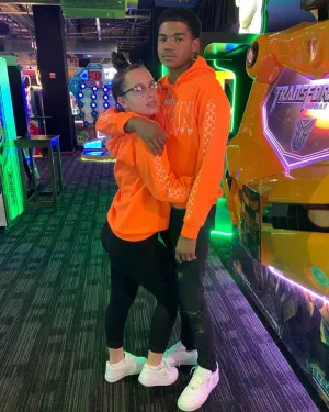 White Drippin Outline | Neon Orange Hoodie (Outline Checkered Drippin Sleeves)